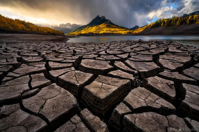 San Juan Mountains and dried lakebed at sunrise, Uncompahgre National Forest, Colorado