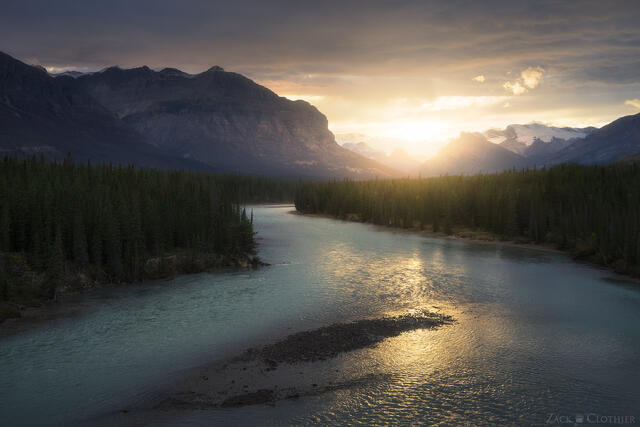 A brilliant autumn sunset over the Saskatchewan River in the Kootenay Plains Provincial Area in Alberta