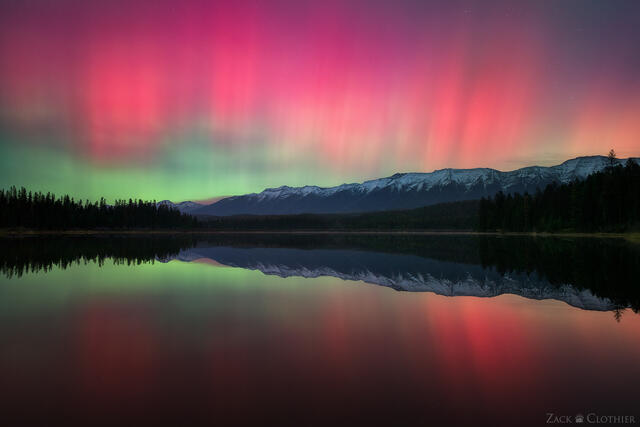 Aurora over mountain lake, Seeley-Swan Valley, Montana
