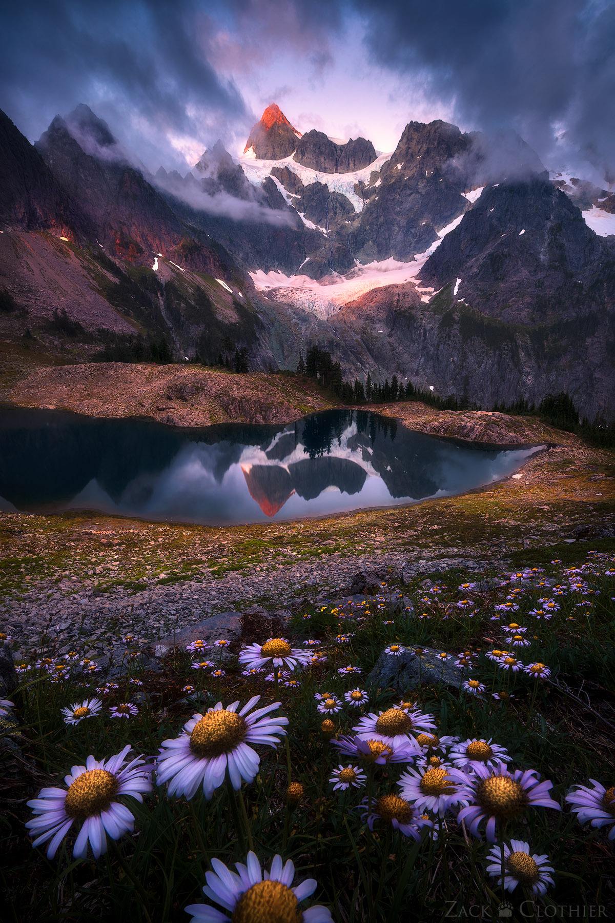 THE MOUNTAIN Clouds swirl over Mount Shuksan and Lake Anne at sunset, Mount Baker Wilderness, Washington